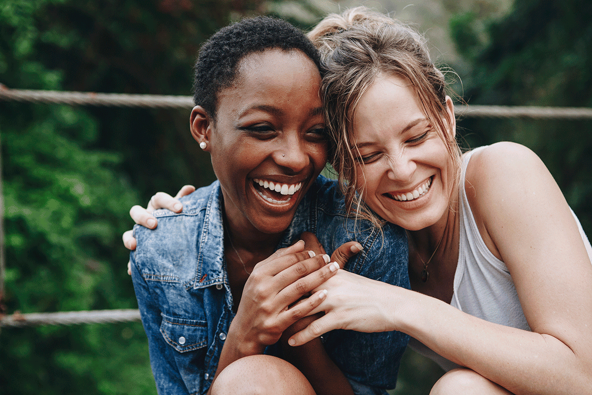 two female friends laughing